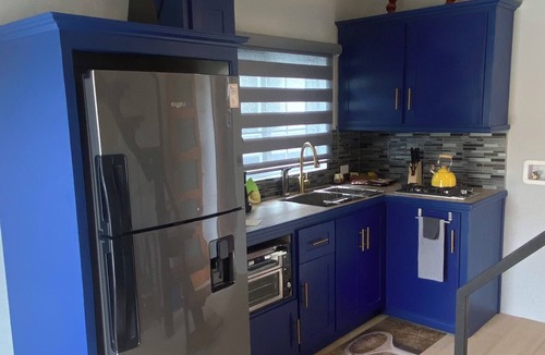 Chaguanas House | TinyUrb, a modern tiny house, big on comfort but with tiny living experience.