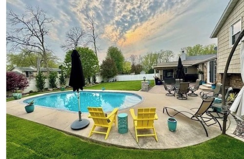 Ashwaubenon House | Titletown Gem: Steps to Lambeau, Heated Pool, Hot Tub & Entertainment HQ