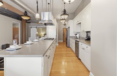Wholesale District Condo | Top Floor Loft! 4 Bedrooms and 2,000 sq ft