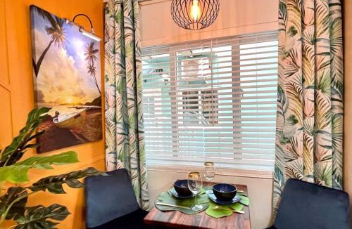 Bon Accord Village Apartment | TOPAZ Classy, cozy condo near beaches & airport