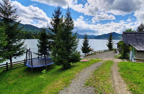 Colibita House | Traditional Fisherman's house Colibita, lakefront with view and pontoon
