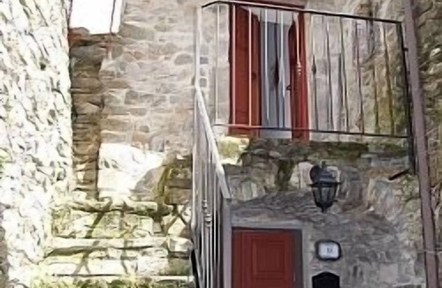 Tresana Villa | Traditional stone villa with terrace & gardens, in the hills of Lunigiana, Northern Tuscany.