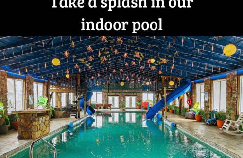 Bryant House | Trails End Cabin with a hot tub fire pit & indoor pool