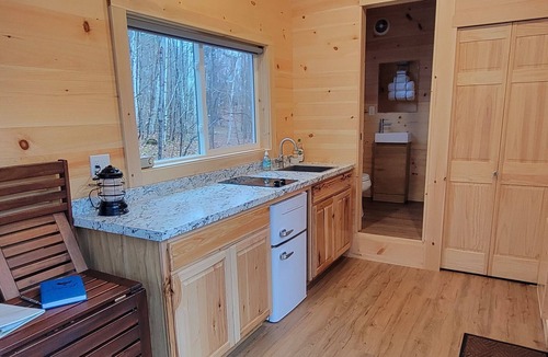 Dorchester Apartment | Trailside Stays - Tiny House in the Woods-Escape to Nature. Blue Jay