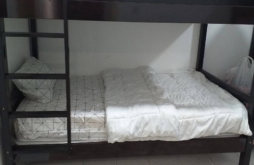 Al Qusais Bed & Breakfast | Tranquil 2-bedroom hostel in brilliant Dubai with AC, WiFi Safe and clean.