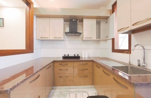 Sushant Lok Apartment | Tranquil 2BR Oasis with Balcony & Bathtub