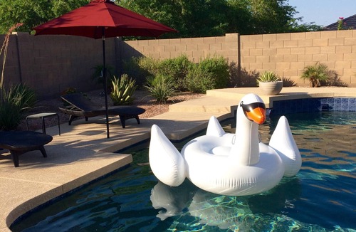 Estrella Mountain Ranch House | Tranquil Backyard with Pool/Spa, BBQ, and Putting Green.