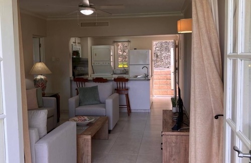 Rendezvous Apartment | Tranquil condo on Rockley Golf Course with relaxing pool & includes 1 golf pass