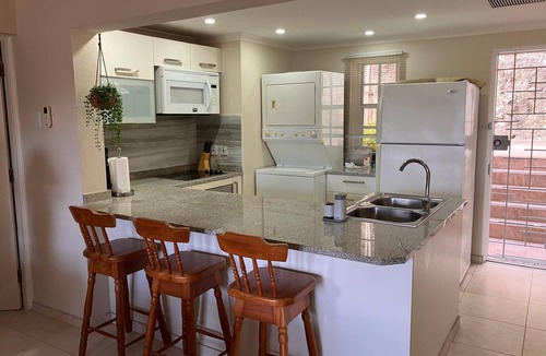 Rendezvous Apartment | Tranquil condo on Rockley Golf Course with relaxing pool & includes 1 golf pass