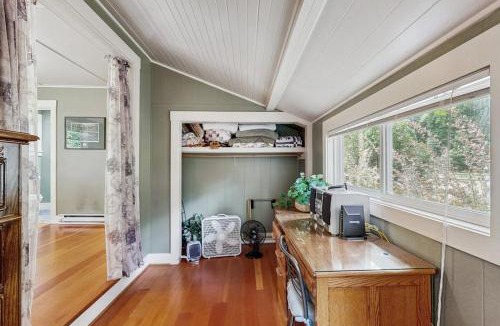 Molalla House | Tranquil landscape with riverside firepit gas grill gas fireplace and deck