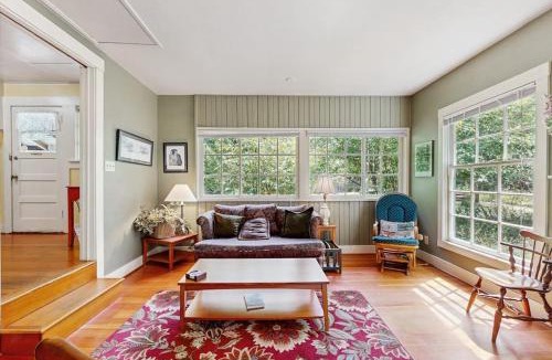 Molalla House | Tranquil landscape with riverside firepit gas grill gas fireplace and deck