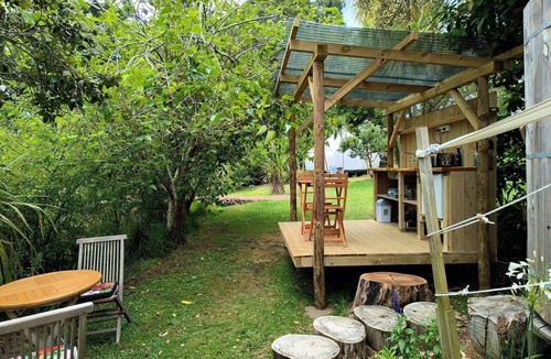 Oneroa RV Rental | Tranquil Pondside Glamping with Outdoor Kitchen near Wildlife Haven in Waiheke Island, NZ