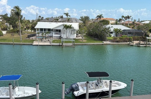 Shell Harbor Condo | Tranquil WATERFRONT 2-bedroom condo on Sanibel Island minutes to the beach!