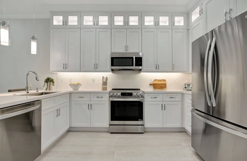 Stuart House | Tranquil Waters New Waterfront Townhome - Boat slip with lift included.