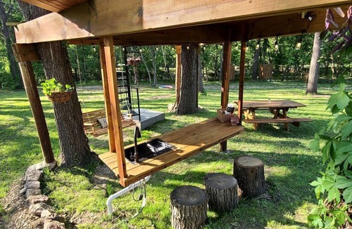 Eureka Springs RV Rental | Tree House Glamping Destination near the Ozarks, with River Access for Swimming and Fishing