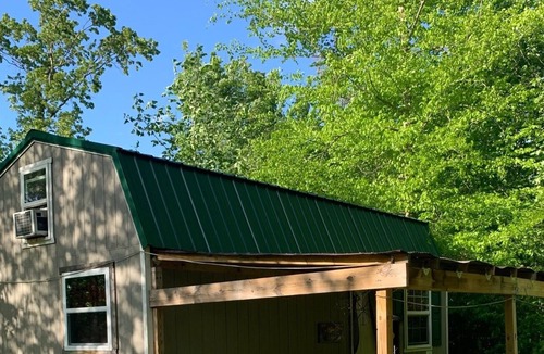 Jonesborough Cabin | Tree house themed tiny house in a tiny house community mountain retreat.