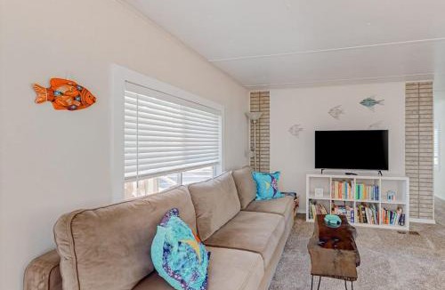 Florence House | Tree-lined coastal home with children's items gas grill and washer&dryer