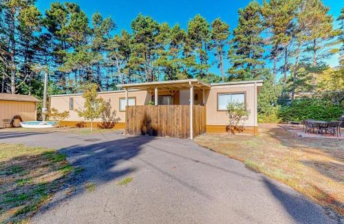 Florence House | Tree-lined coastal home with children's items gas grill and washer&dryer