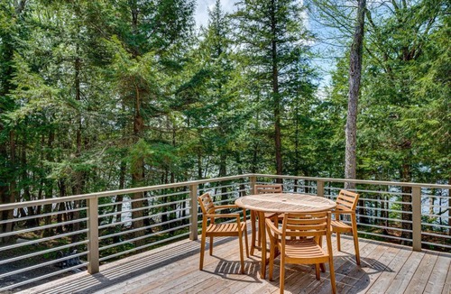 Craftsbury Common House | Tree-Lined Group Retreat on Little Hosmer Pond