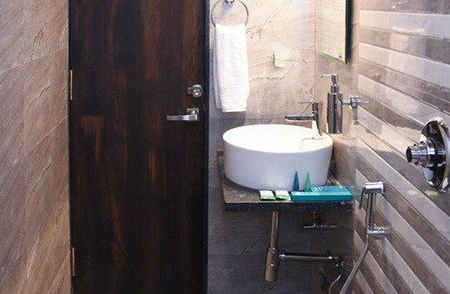 Nigdi Hotel | Treebo Malhaar Regency