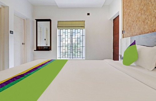 Guruvayur Hotel | Treebo Sreepathi Mayoogha