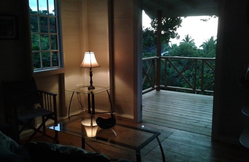 Toucari Cottage | Treetops. A beautiful timber cottage, sea view, private and close to the beach.