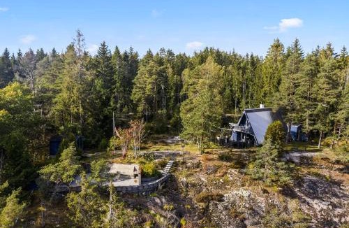 Moss House | Trekanthytte