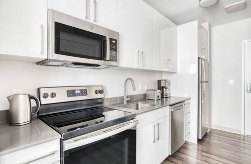 St. Elizabeth's Apartment | Trendy Brighton Studio w/W/D, Gym, near T, Shops + Dining, by Blueground