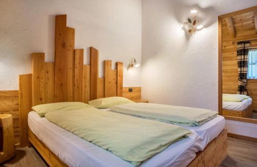 Sant'Antonio di Mavignola Ski Chalet | Trilocale Chalet Camping Faè 6
