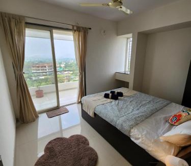 Nashik Apartment | Trinity Stays Nashik - Mountain view Entire Apartment close to Sula