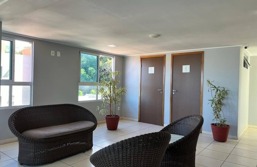 Cabo Branco Hotel | Triple suite with side sea view
