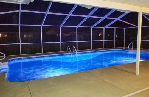 Ono Island House | Tropic stay with large outdoor pool bikes AC & pool table - snowbird-friendly