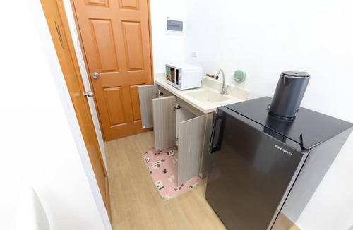 Maribago Condo | Tropical 2BR with pool Pets OK and Walk to near famous beach spot in mactan