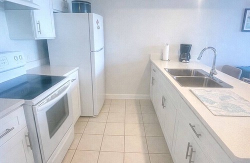 Williams Town Condo | Tropical Oasis: Ocean View ~ Pool & Bar ~ Family-Friendly