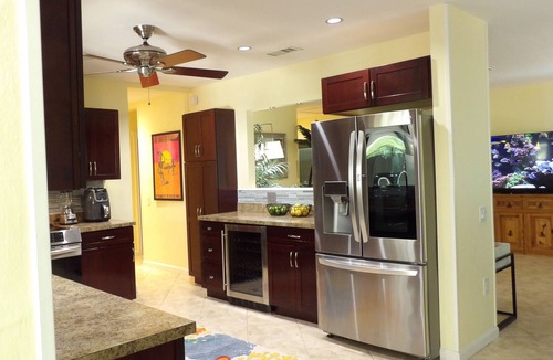 Singer Island House | Tropical Paradise Home Steps to Beach Heated Pool Game Rm Singer Island Retreat!