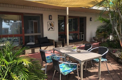 Manning Point House | Tropical paradise surrounded by glistening waters is just waiting for you