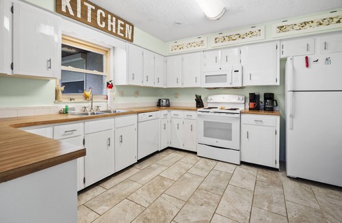 St. Augustine South House | Tropical Pool Retreat - Pet-Friendly, Fenced Yard