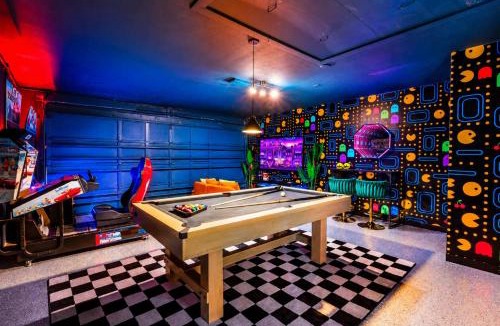 Clearwater House | Tropical pop art getaway w Pool & Game Room
