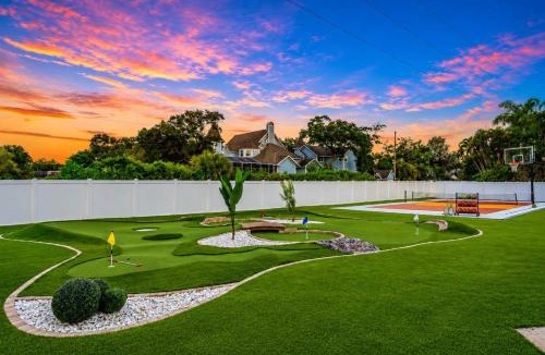 Clearwater House | Tropical pop art getaway w Pool & Game Room