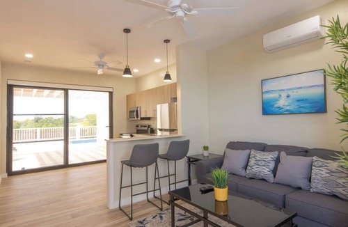 Leeward Settlement Apartment | Tropical Stay Near Beach w/Pool Access & Parking