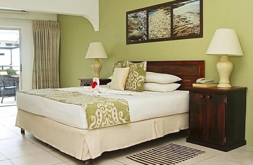 Sunset Crest Apartment | Tropical Sunset Beach Apartment Hotel