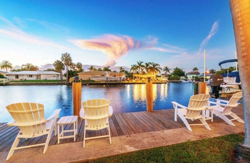Cypress Lakes Villa | Tropical Waterfront Home: Pool & Boat Rental