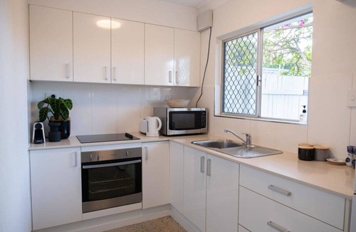 Parramatta Park Apartment | Tropicana Courtyard - Stylish Tropical Retreat with Private Courtyard & Prime Location
