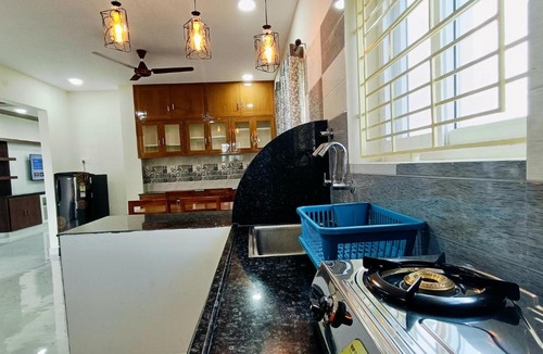 Tirupati Apartment | TrueLife - Chinmai Nivas - Breakfast Included - Modern 2BHK homes for families - Tirumala Mountain View - Fast WiFi - Many restaurants nearby - Hall, AC bedrooms, Modular Kitchen - Android TV - 250 Jio Channels - Top Service with lots of Love