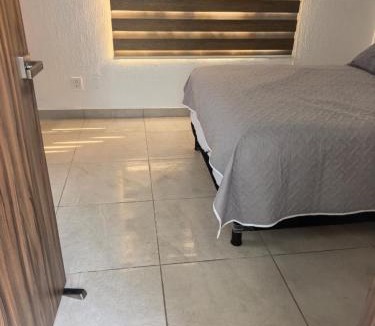 Oaxtepec House | Tu escapada perfecta en Cocoyoc, Jacuzzi, Asador y jardín privado