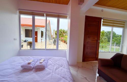 Lemery Hotel | TUBURAN Poolside