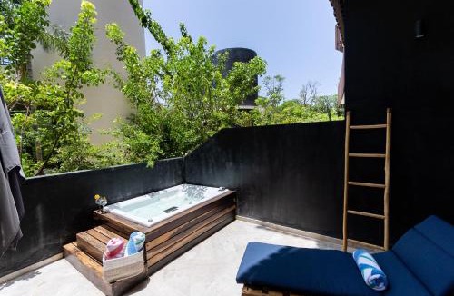 Playa Paraiso Apartment | Tulum Escape - Jacuzzi - Free bikes & Beach