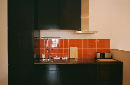 Werder Apartment | TURMVILLA upper floor: balcony, wood-burning stove and water access