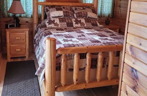 Bidwell Cabin | Twin Oaks is a rustic and pet friendly cabin located on 50 mostly wooded acres
