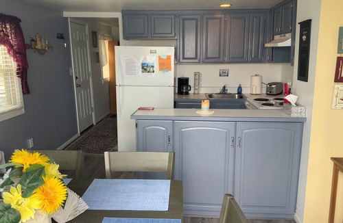 Manitou Beach-Devils Lake Cottage | Two Bed Rooms with a sunrise lakefront view